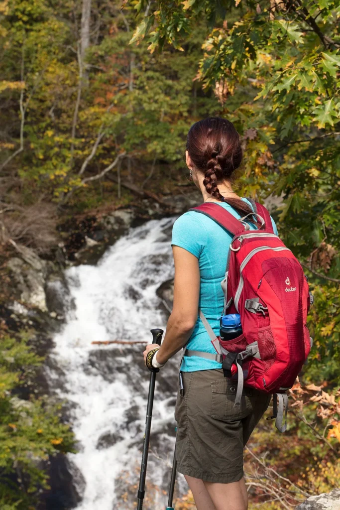Hiker at Whiteoak Canyon Falls in Shenandoah National Park