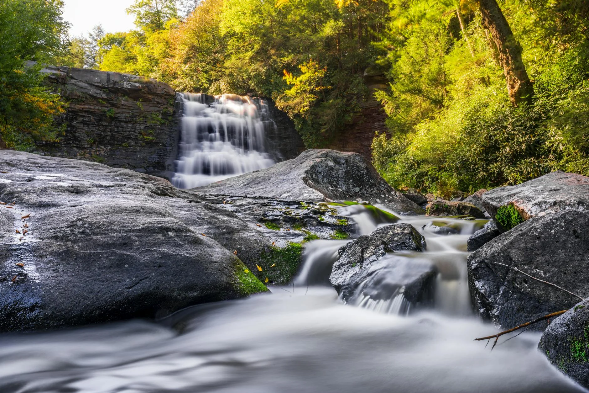 Waterfall flowing through autumn forest in Maryland