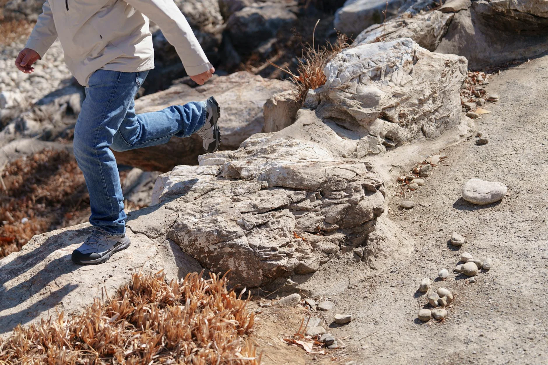 Climbing rocks on a trail